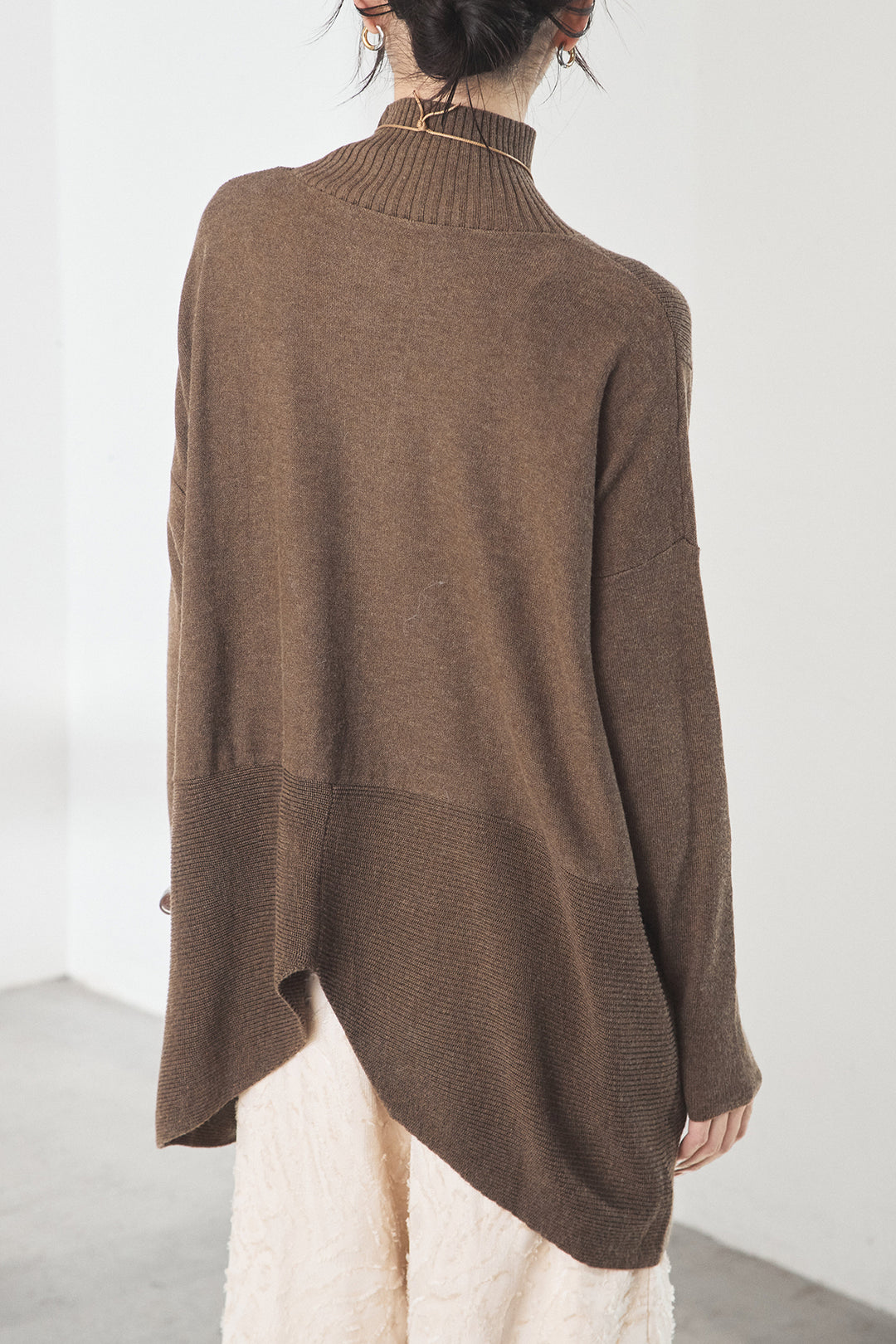 裾クロスデザインニットトップス