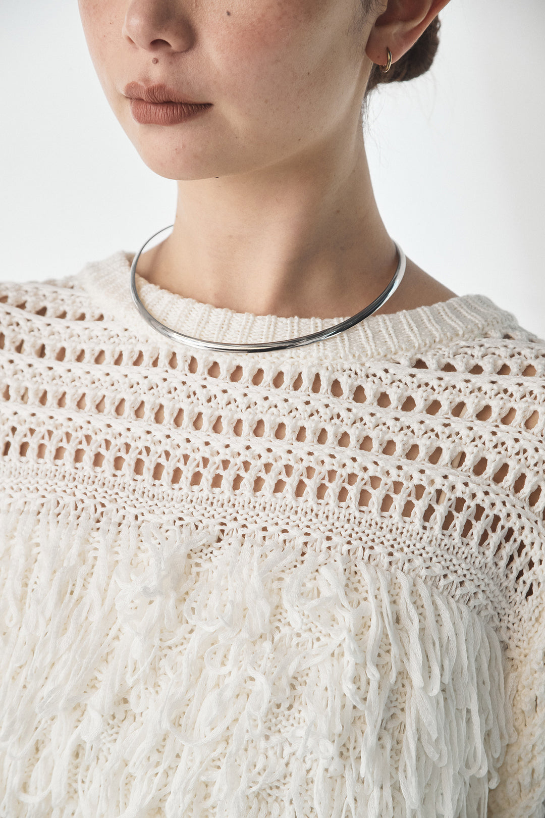 メッシュフリンジ切り替えプルオーバー