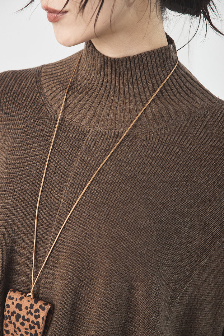 裾クロスデザインニットトップス