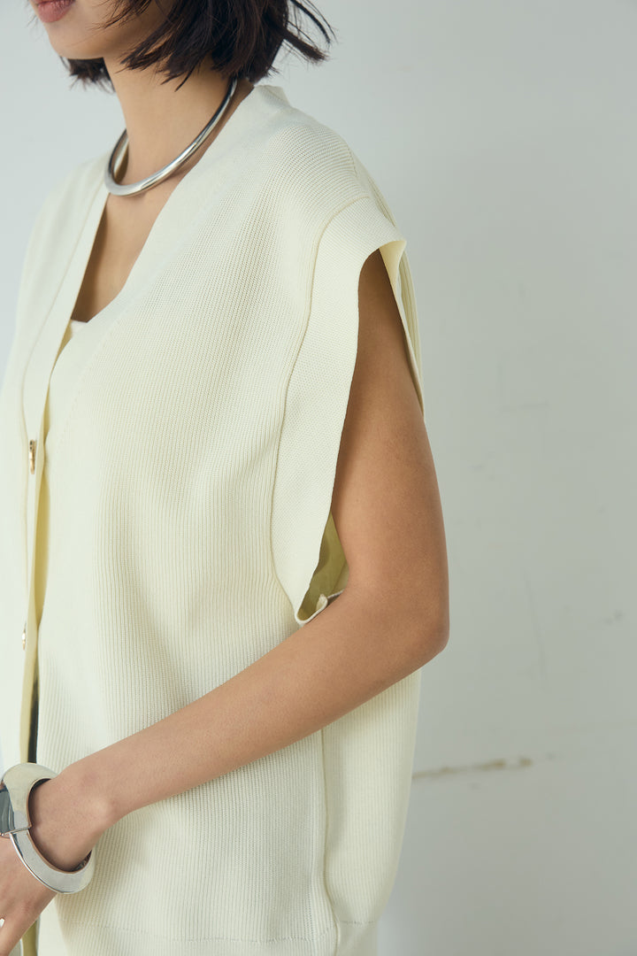 ポリウーリーメタルボタンベスト