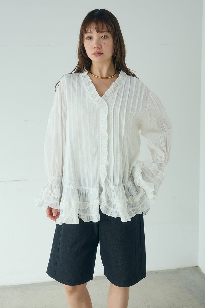 Vネックランダムフリルブラウス