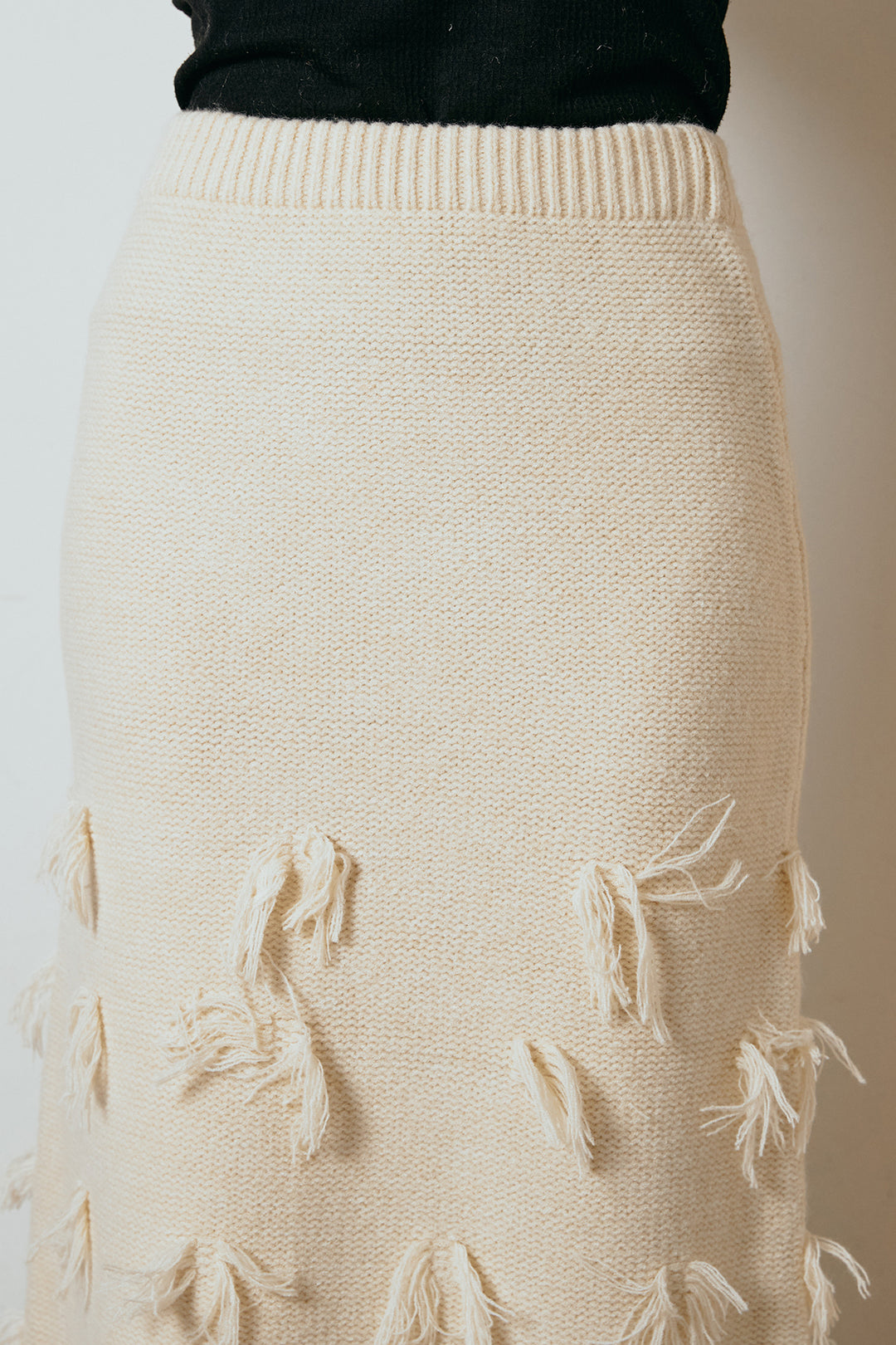ポイントフリンジニットナロースカート